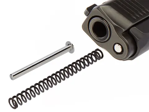 An NDZ guide rod and recoil spring beside a pistol slide